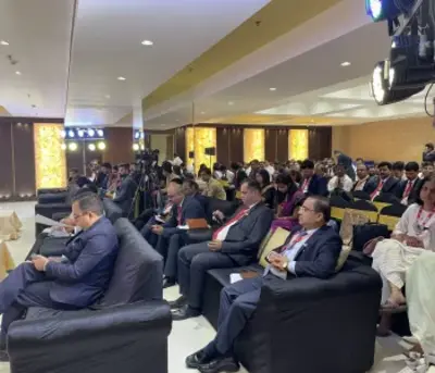 Professionals attending a corporate event at a modern corporate party venue with conference seating