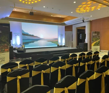 Stage and seating setup in corporate party venue